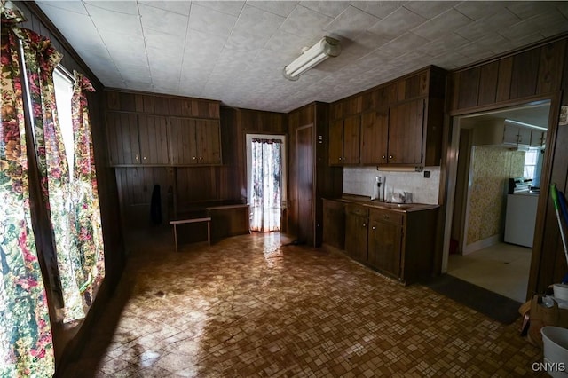 202 County Highway 25a, Richfield, NY 13439 - kitchen with range and wooden walls