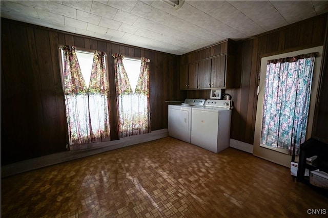 202 County Highway 25a, Richfield, NY 13439 - laundry area featuring cabinet space, washer and clothes dryer, and wooden walls