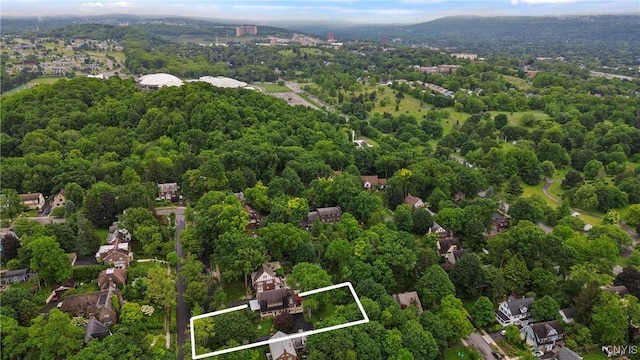 306 Berkeley Dr, Syracuse, NY 13210 - aerial view of property and surrounding area with property boundaries highlighted and a forest