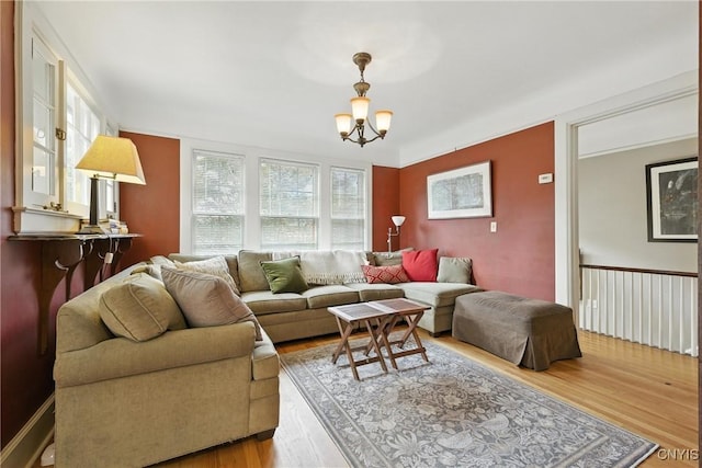 306 Berkeley Dr, Syracuse, NY 13210 - living area with wood finished floors and a chandelier
