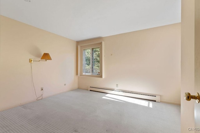 20 Cross Rd, Dewitt, NY 13224 - carpeted spare room featuring a baseboard radiator