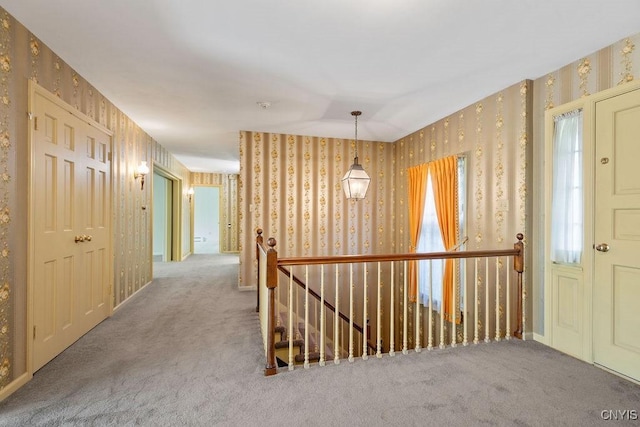 20 Cross Rd, Dewitt, NY 13224 - hall featuring an upstairs landing, carpet flooring, and wallpapered walls