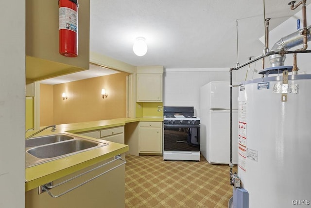 20 Cross Rd, Dewitt, NY 13224 - kitchen featuring white appliances, gas water heater, light countertops, and cream cabinets