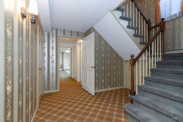 20 Cross Rd, Dewitt, NY 13224 - stairway featuring wallpapered walls and carpet floors