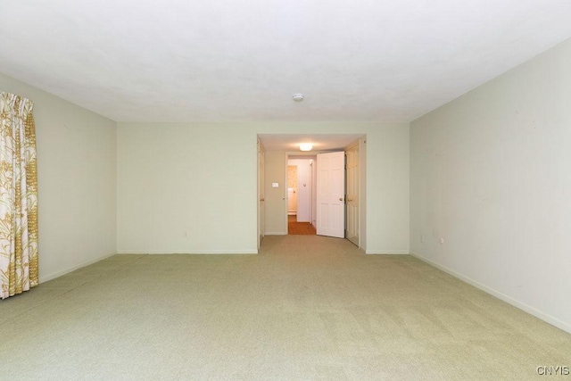 20 Cross Rd, Dewitt, NY 13224 - unfurnished room with light carpet and a smoke detector
