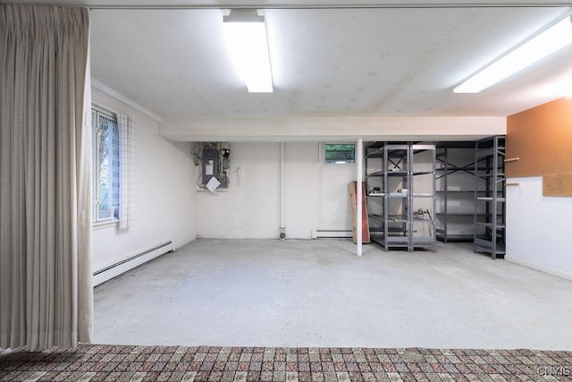 20 Cross Rd, Dewitt, NY 13224 - basement with a baseboard heating unit, electric panel, and baseboard heating