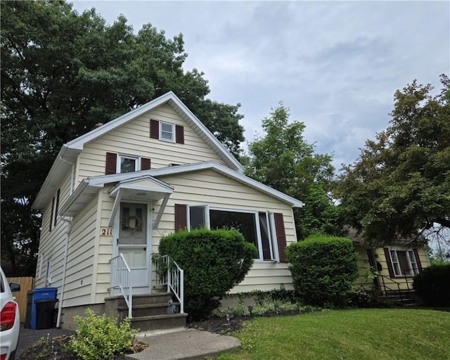 211 Steko Ave, Rochester, NY 14615 - view of front of home with a front lawn and entry steps