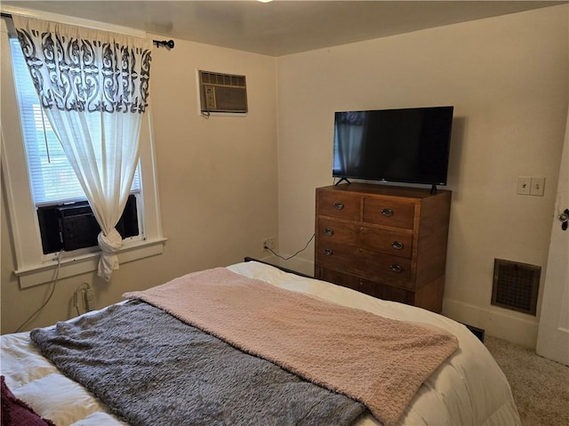 211 Steko Ave, Rochester, NY 14615 - bedroom featuring a wall mounted air conditioner and carpet floors