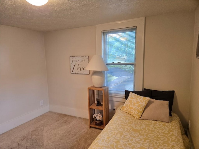 211 Steko Ave, Rochester, NY 14615 - carpeted bedroom featuring a textured ceiling and baseboards