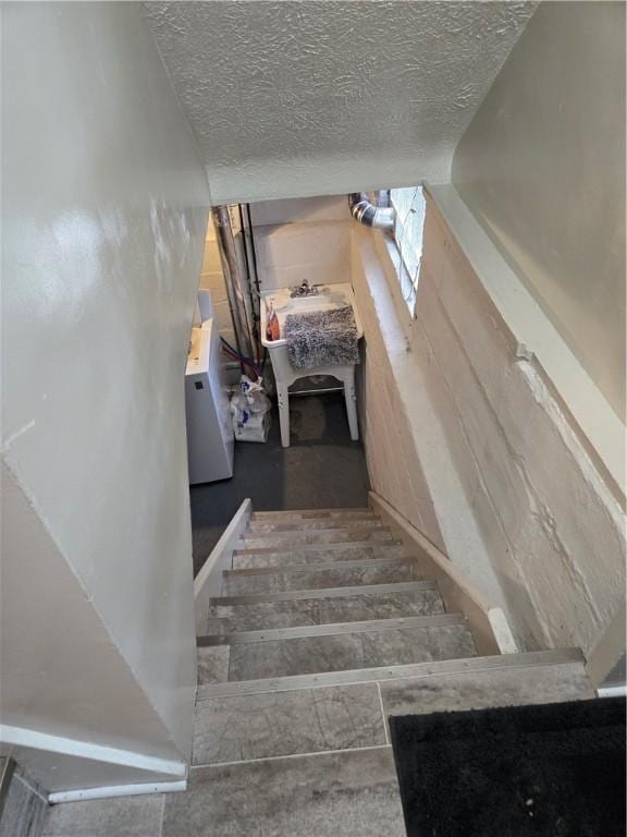 211 Steko Ave, Rochester, NY 14615 - stairs with a textured ceiling