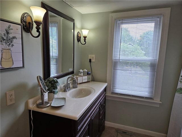 211 Steko Ave, Rochester, NY 14615 - bathroom with vanity and baseboards