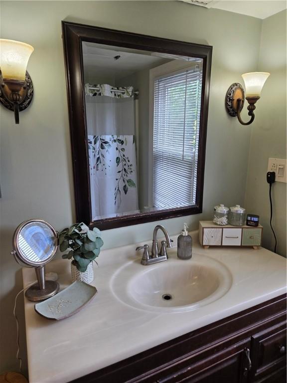 211 Steko Ave, Rochester, NY 14615 - full bath with vanity and a shower with curtain