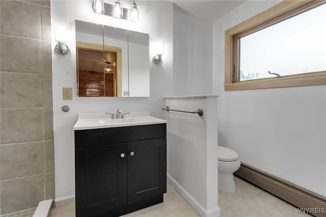 1520 Davis Rd, Aurora, NY 14170 - bathroom featuring a baseboard heating unit, vanity, and tile patterned flooring