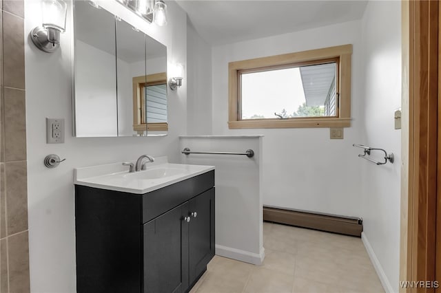 1520 Davis Rd, Aurora, NY 14170 - bathroom featuring a baseboard heating unit, vanity, and tile patterned floors