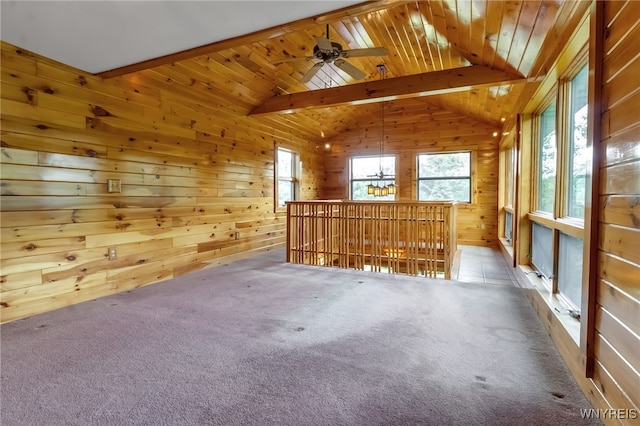 1520 Davis Rd, Aurora, NY 14170 - unfurnished living room with healthy amount of natural light, wood walls, carpet, ceiling fan, and wood ceiling