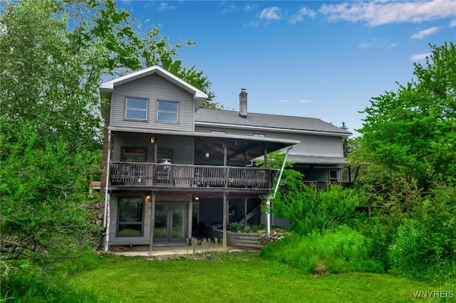 1520 Davis Rd, Aurora, NY 14170 - rear view of property with a deck, a chimney, a lawn, and french doors