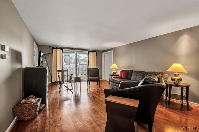32 Bernhardt Dr Unit 5, Amherst, NY 14226 - living area with wood finished floors and baseboards