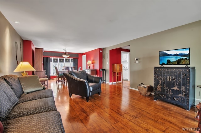 32 Bernhardt Dr Unit 5, Amherst, NY 14226 - living area featuring wood-type flooring and baseboards