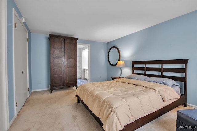 32 Bernhardt Dr Unit 5, Amherst, NY 14226 - bedroom with light colored carpet and connected bathroom