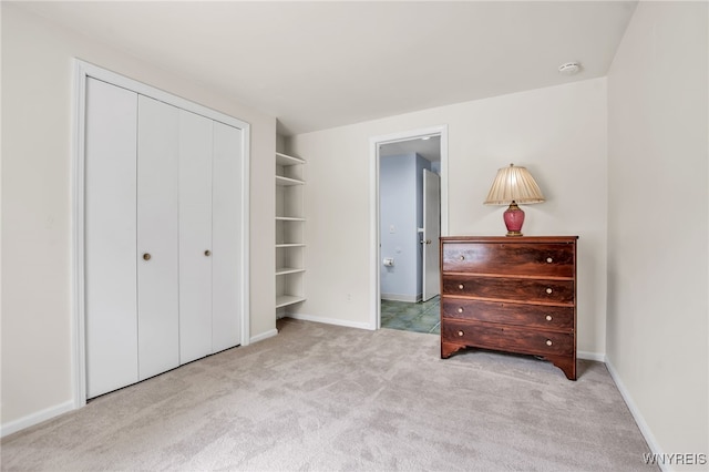 32 Bernhardt Dr Unit 5, Amherst, NY 14226 - bedroom with carpet floors and a closet