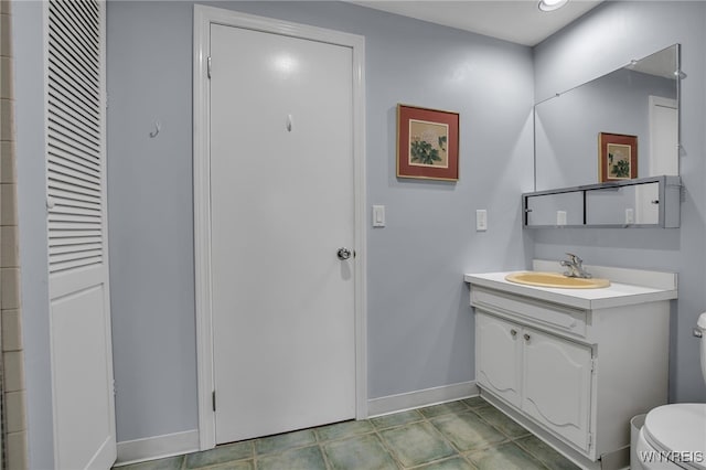 32 Bernhardt Dr Unit 5, Amherst, NY 14226 - bathroom with toilet and vanity