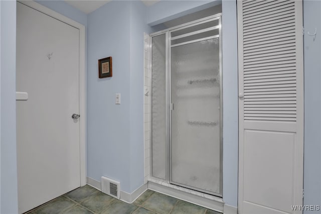 32 Bernhardt Dr Unit 5, Amherst, NY 14226 - full bath featuring a stall shower and tile patterned floors