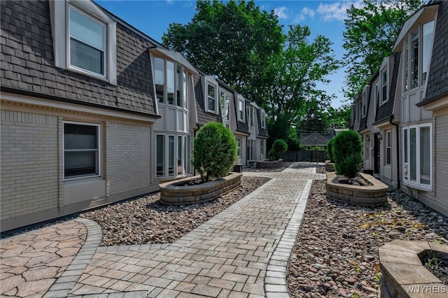 32 Bernhardt Dr Unit 5, Amherst, NY 14226 - surrounding community featuring a patio and a residential view