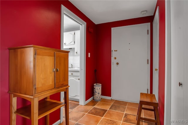 32 Bernhardt Dr Unit 5, Amherst, NY 14226 - foyer entrance with baseboards and light tile patterned flooring