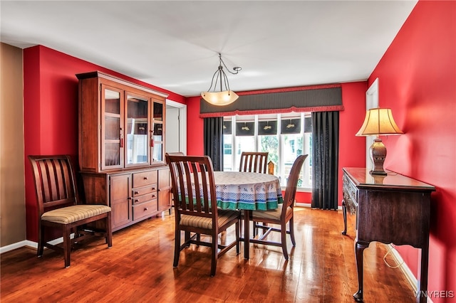 32 Bernhardt Dr Unit 5, Amherst, NY 14226 - dining space with wood finished floors and baseboards