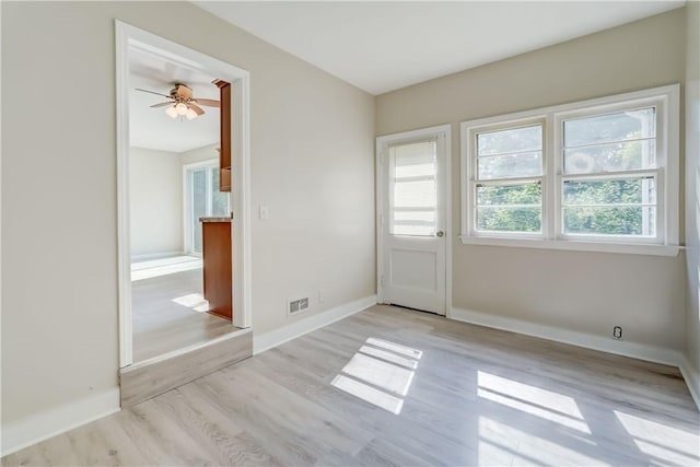 3245 Culver Rd, Irondequoit, NY 14622 - entrance foyer featuring light wood-style floors and ceiling fan