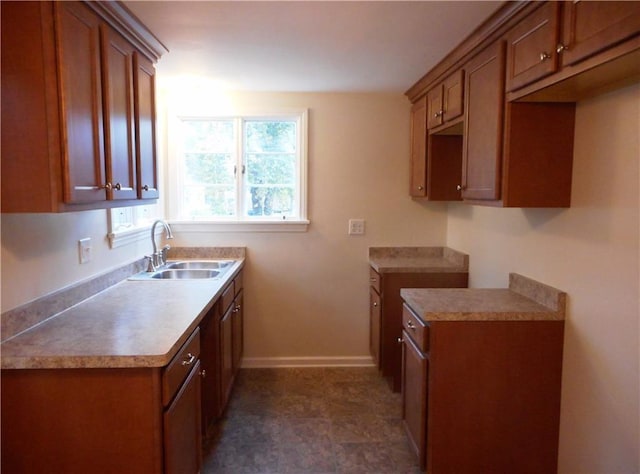 3245 Culver Rd, Irondequoit, NY 14622 - kitchen with brown cabinets and light countertops