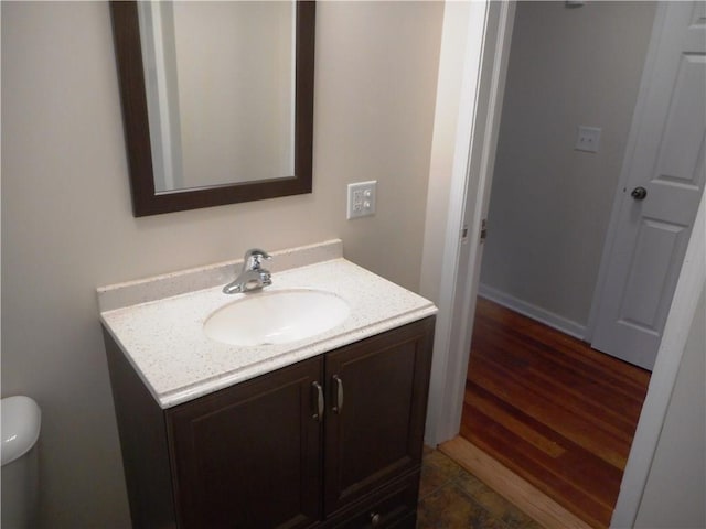 3245 Culver Rd, Irondequoit, NY 14622 - half bathroom featuring vanity and wood finished floors