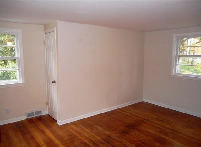 3245 Culver Rd, Irondequoit, NY 14622 - empty room featuring wood finished floors and baseboards