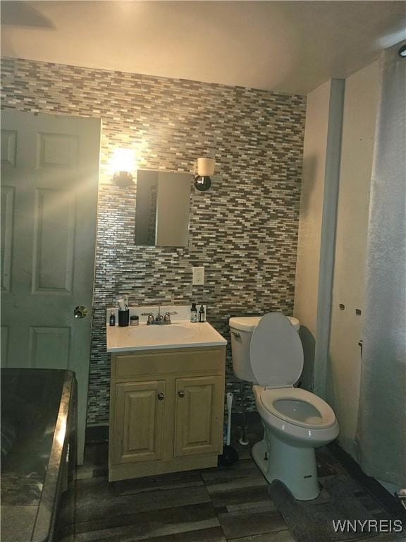 209 W Ferry St Unit S, Buffalo, NY 14213 - bathroom with vanity and decorative backsplash