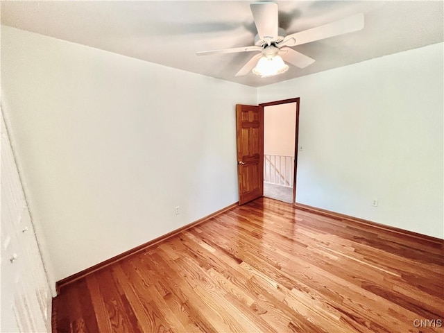 23 Burden Dr, Oswego, NY 13126 - spare room featuring light wood-type flooring and a ceiling fan