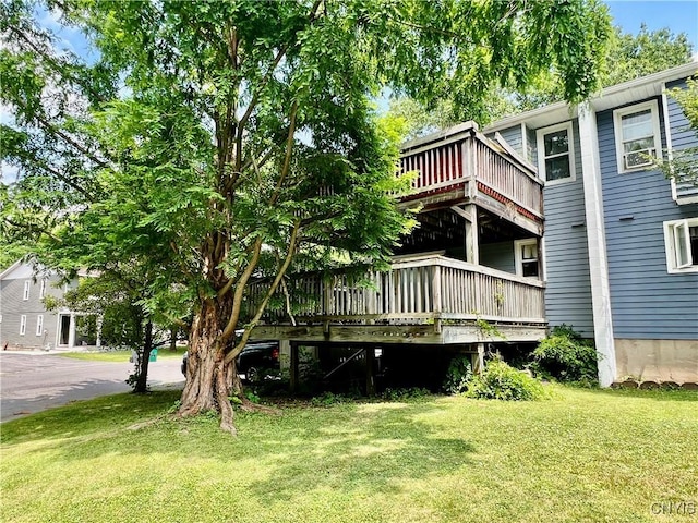 23 Burden Dr, Oswego, NY 13126 - back of house with a yard and a wooden deck