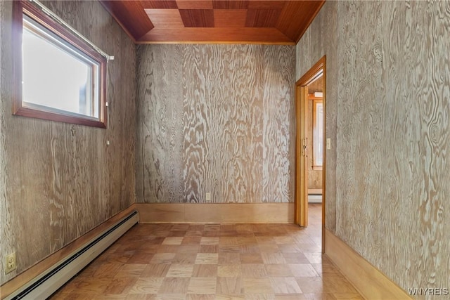 84 Pulaski St, Buffalo, NY 14206 - unfurnished room featuring a baseboard heating unit, wood ceiling, and tile patterned floors
