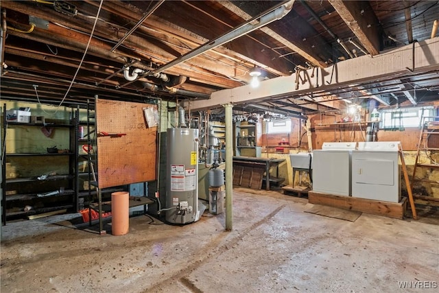 84 Pulaski St, Buffalo, NY 14206 - below grade area with gas water heater, washing machine and dryer, and a workshop area