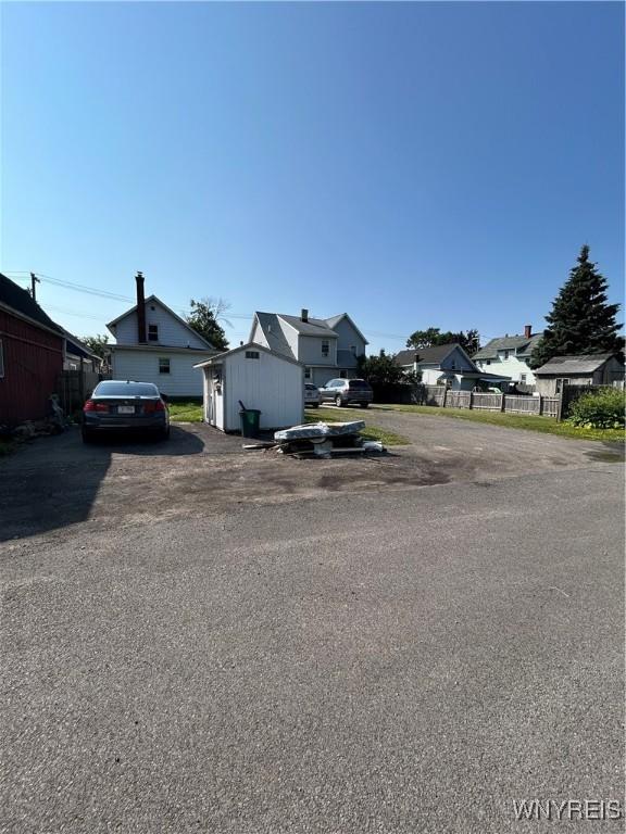 83 Felton St, North Tonawanda, NY 14120 - view of front facade featuring a shed and a residential view