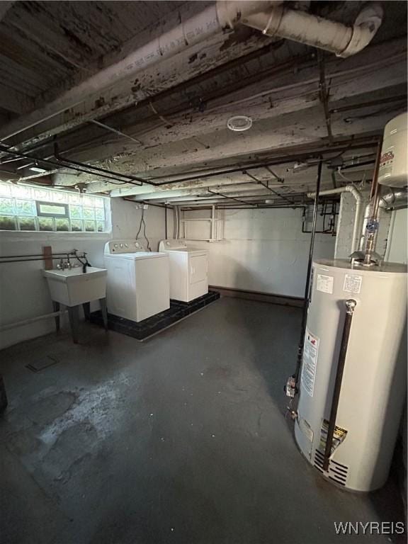 83 Felton St, North Tonawanda, NY 14120 - below grade area featuring water heater and independent washer and dryer