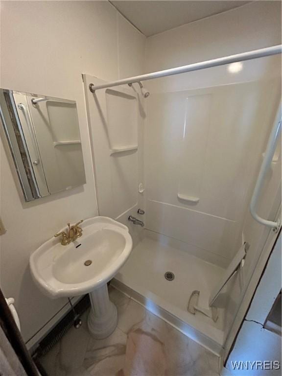 83 Felton St, North Tonawanda, NY 14120 - full bath featuring a shower and marble finish floors