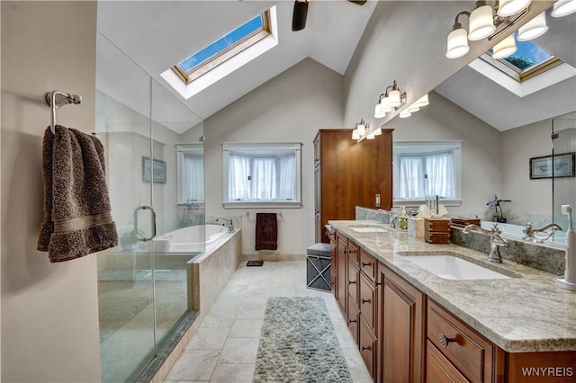 57 Middlebury Rd, Orchard Park, NY 14127 - bathroom with a skylight, double vanity, a bath, a shower stall, and high vaulted ceiling
