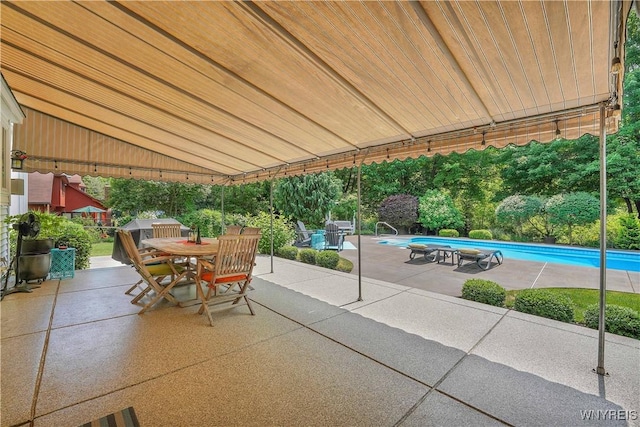 57 Middlebury Rd, Orchard Park, NY 14127 - view of patio / terrace featuring outdoor dining space and an outdoor pool