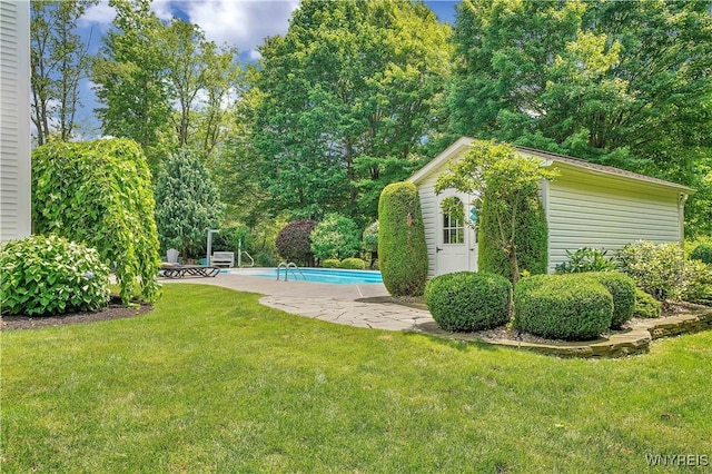 57 Middlebury Rd, Orchard Park, NY 14127 - view of grassy yard with an outbuilding and an outdoor pool