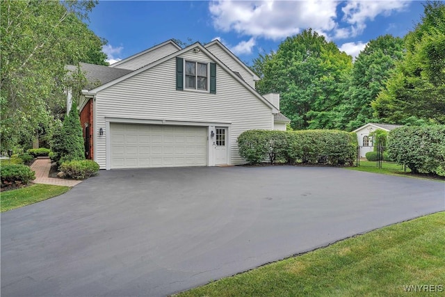 57 Middlebury Rd, Orchard Park, NY 14127 - view of home's exterior featuring asphalt driveway
