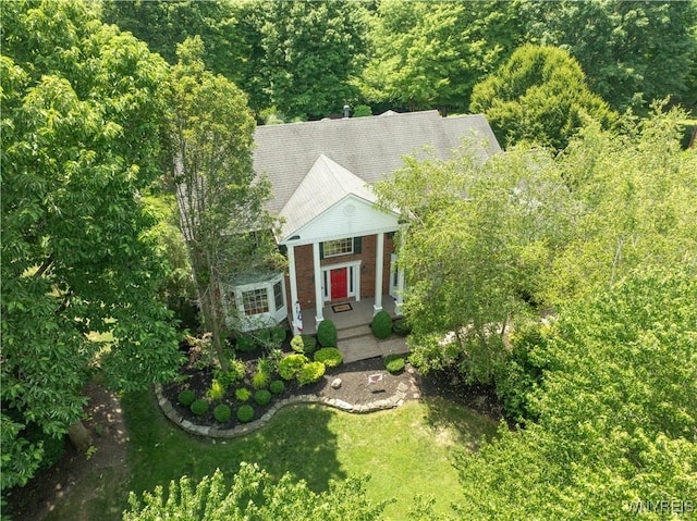 57 Middlebury Rd, Orchard Park, NY 14127 - greek revival inspired property with a front yard and a porch