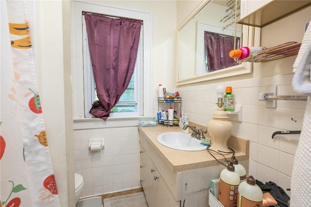 147 Springfield Ave, Rochester, NY 14609 - full bath with tile walls, vanity, and wainscoting