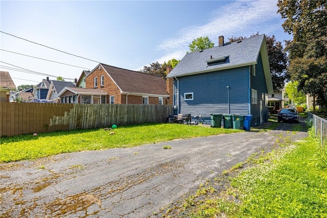 147 Springfield Ave, Rochester, NY 14609 - rear view of property with a chimney