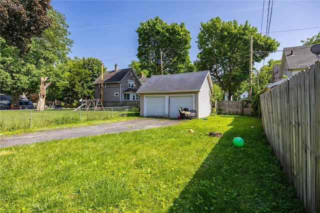 147 Springfield Ave, Rochester, NY 14609 - view of yard with a garage and an outdoor structure