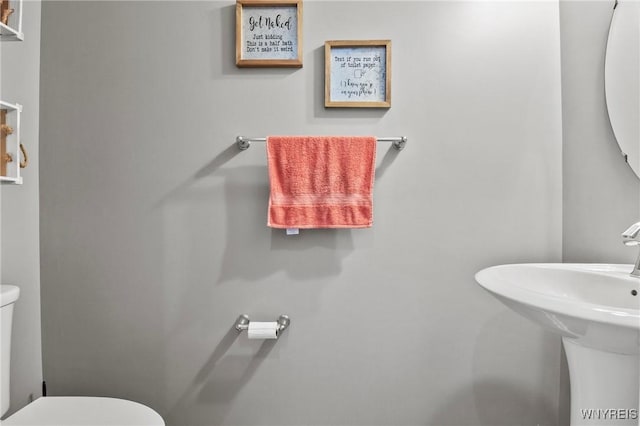 111 Aegean Ave, Amherst, NY 14228 - half bathroom featuring toilet and a sink